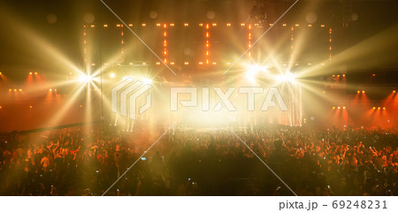 Concert crowd having fun at a rock concert. 69248231