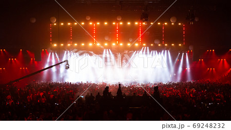 Concert crowd having fun at a rock concert. 69248232