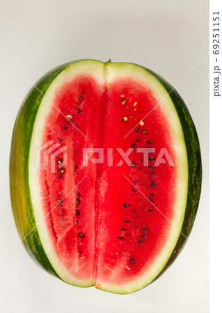 Sliced ripe watermelon on white background, top view Sliced ripe watermelon on white background, top view 69251151