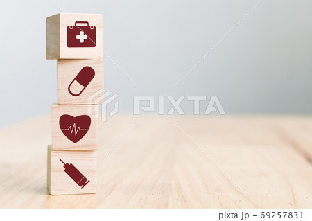Wood block stacking with icon healthcare medical with copy space 69257831