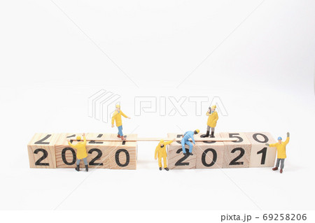 New year 2020 change to 2021 concept, with small figure New year 2020 change to 2021 concept, with small figure 69258206