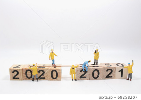 New year 2020 change to 2021 concept, with small figure 69258207
