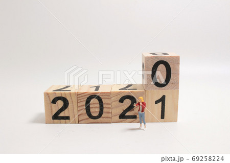 New year 2020 change to 2021 concept, with small figure 69258224