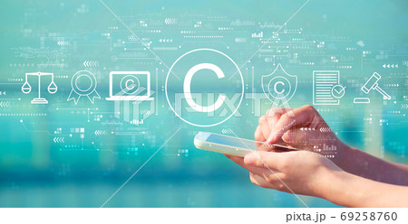 Copyright concept with smartphone Copyright concept with smartphone 69258760