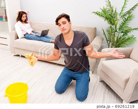 Young family doing cleaning at home 69261219