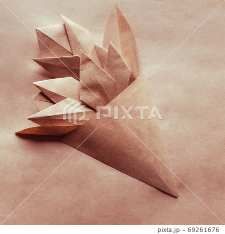 Bouquet of origami tulips on craft background 69261676