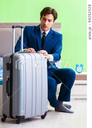 Businessman working in the hotel room Businessman working in the hotel room 69262028