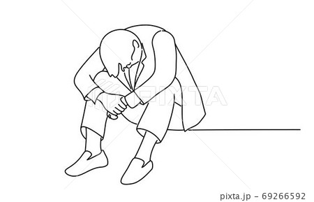 Businessman sitting lowering his head. 69266592
