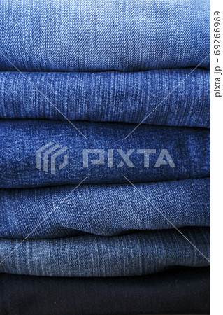 Pile of denim pants 69266989