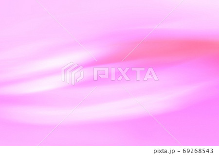抽象的背景 赤色系 ピンク色 ゆるやかな流れ ラインの写真素材