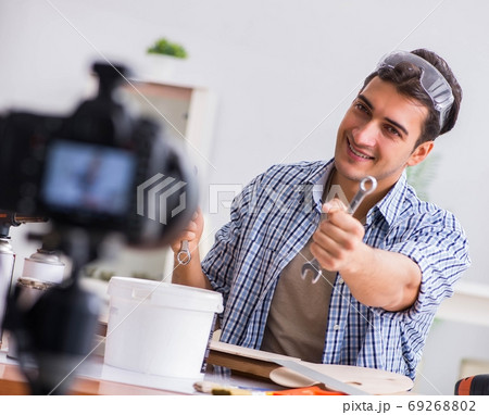 DIY blogger recording video of woorworking hobby DIY blogger recording video of woorworking hobby 69268802