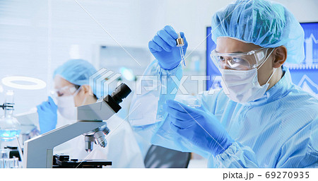 asian scientist take petri dish asian scientist take petri dish 69270935
