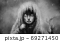 A girl with one eye stands in the gloom and looks frighteningly. 69271450