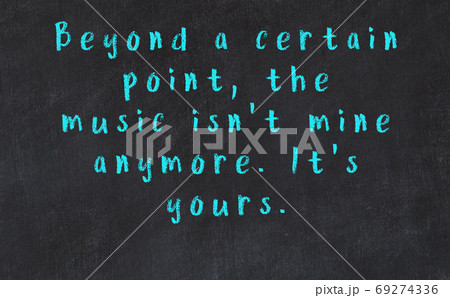 Black chalkboard with wise inscription on it Black chalkboard with wise inscription on it 69274336