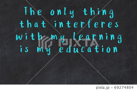 Chalk wise inscription on black chalkboard 69274804