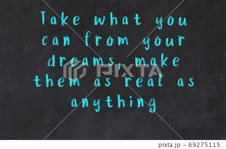 Black chalkboard with wise inscription on it Black chalkboard with wise inscription on it 69275115