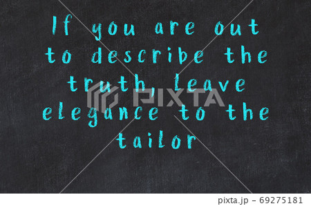 Chalk inscription of smart quote on black desk 69275181