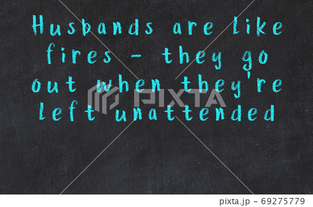 Chalk inscription of smart quote on black desk Chalk inscription of smart quote on black desk 69275779