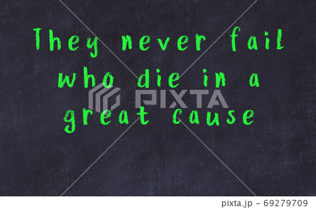 Chalk wise inscription on black chalkboard 69279709