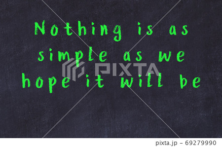 Chalk wise inscription on black chalkboard Chalk wise inscription on black chalkboard 69279990