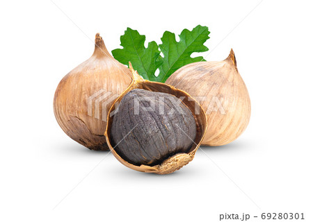 Black garlic on white background Black garlic on white background 69280301