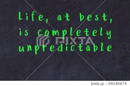 Chalk wise inscription on black chalkboard Chalk wise inscription on black chalkboard 69280674