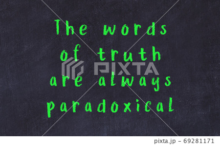 Black chalkboard with wise inscription on it Black chalkboard with wise inscription on it 69281171