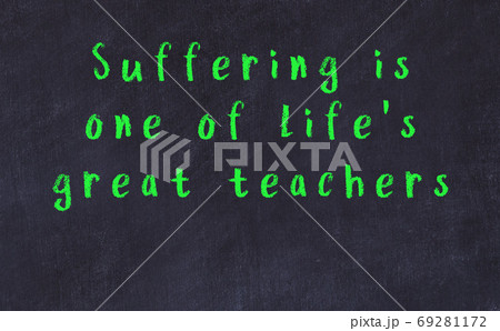 Chalk inscription of smart quote on black desk Chalk inscription of smart quote on black desk 69281172