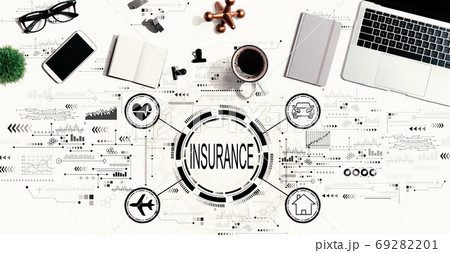Insurance concept with a laptop computer Insurance concept with a laptop computer 69282201