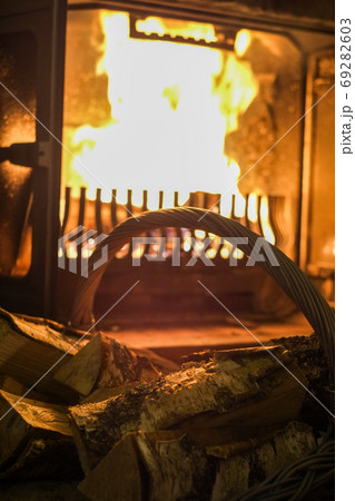 Wood and fireplace burning 69282603