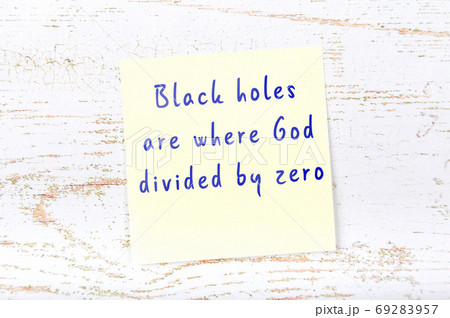 Wise quote on sticky note on wooden wall  69283957