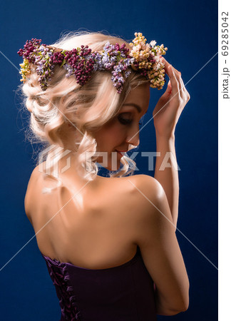 in a lilac wreath having fun background blue, with day in a lilac wreath having fun background blue, with day 69285042