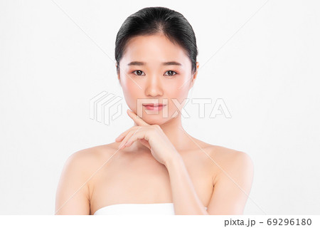 Beautiful young asian woman with clean fresh skin on white background, Face care, Facial treatment, 69296180