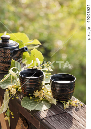 Linden tea and flowers. 69298922