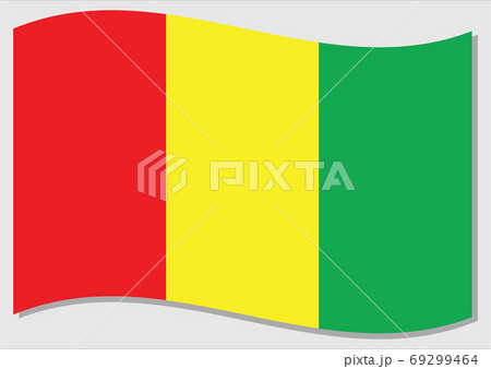 Waving flag of Guinea vector graphic. Waving Guinean flag illustration. Guinea country flag wavin in the wind is a symbol of freedom and independence. 69299464