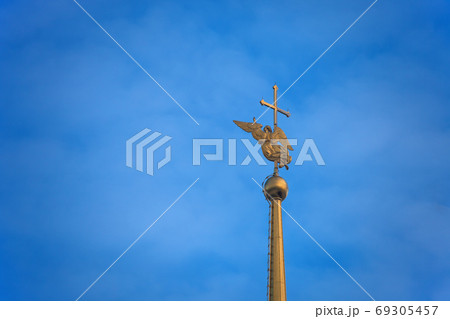 The angel on the spire of the Peter and Paul Cathedral in St. Petersburg. 69305457