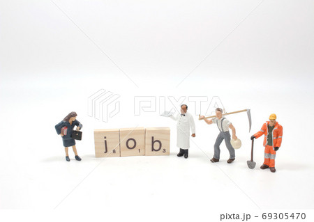 a Wood block word JOB and business man with copy space 69305470
