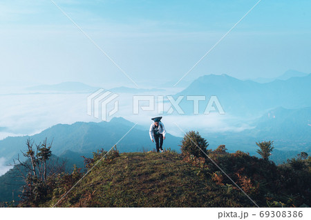 Mountains and fog in the morning on the hill Mountains and fog in the morning on the hill 69308386