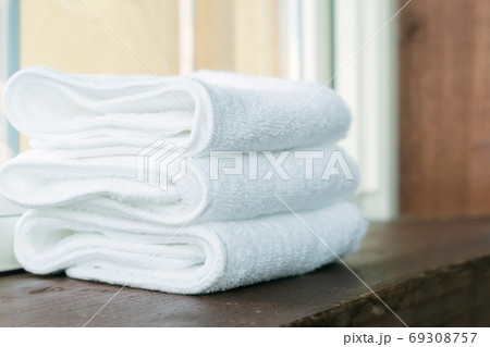 Stacked white spa towels Stacked white spa towels 69308757