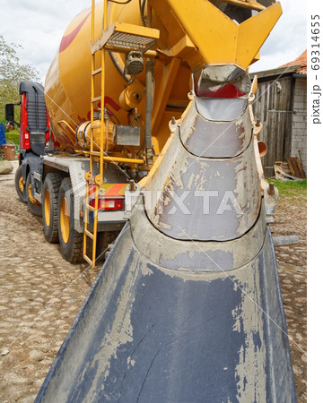 Direct view of the empty ramp of a concrete mixer Direct view of the empty ramp of a concrete mixer 69314655