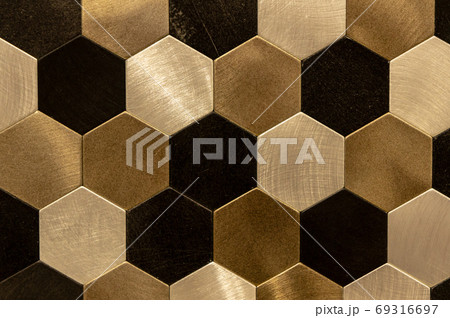 Golden hexagon cell tiling on the luxury decoration interior Gold metal honeycomb, hexagon, abstract metal background 69316697