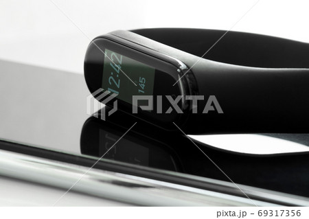 Black fitness watch or activity tracker with time Black fitness watch or activity tracker with time 69317356