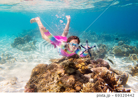 Child snorkeling. Kids underwater. Beach and sea. Child snorkeling. Kids underwater. Beach and sea. 69320442