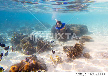 Child snorkeling. Kids underwater. Beach and sea. 69321111