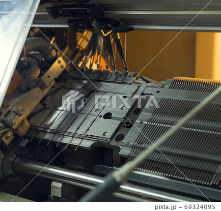 Knitting machine and a manual crochet cropped shot 69324095