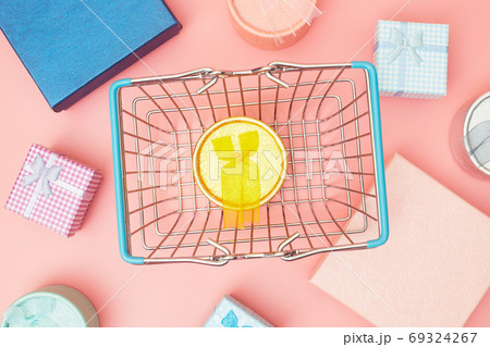 concept black friday, gift boxes with shopping cart on pink pastel background, copy space, flatlay concept black friday, gift boxes with shopping cart on pink pastel background, copy space, flatlay 69324267