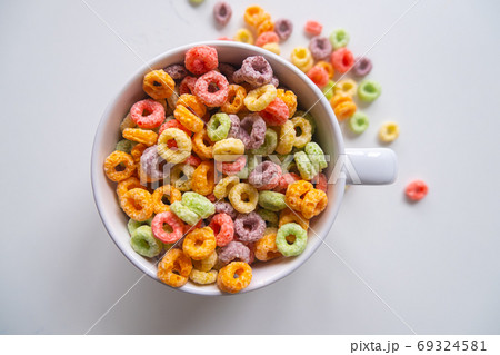 top view of Colored Breakfast Cereal in a white Bowl top view of Colored Breakfast Cereal in a white Bowl 69324581