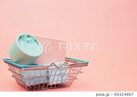 concept black friday, gift boxes with shopping cart on pink pastel background, copy space, flatlay concept black friday, gift boxes with shopping cart on pink pastel background, copy space, flatlay 69324667