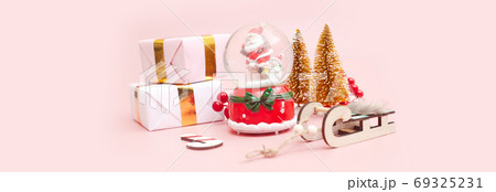 Banner, Christmas composition, gifts on pastel pink background, copyspace Banner, Christmas composition, gifts on pastel pink background, copyspace 69325231