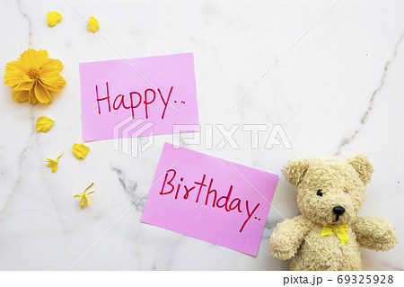 happy birthday message card handwriting with yellow flowers cosmos ,teddy bear happy birthday message card handwriting with yellow flowers cosmos ,teddy bear 69325928